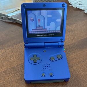 Nintendo Game Boy Advance SP - Vibrant Blue and Super Mario game